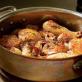 Chicken drumsticks in a frying pan